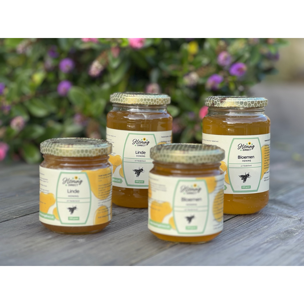 Pot Nederlandse bloemenhoning en Lindehoning met label en herkomststicker – ambachtelijke honing van lokale bijen, zacht en puur