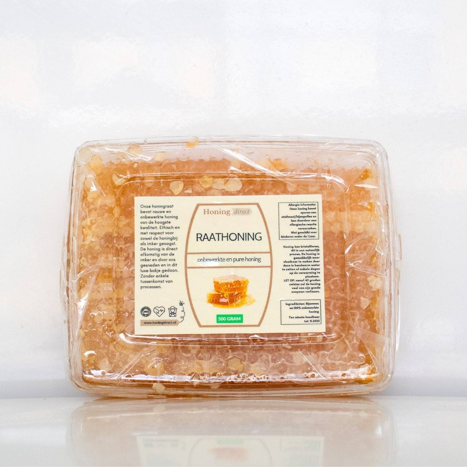 vooraanzicht honingraat in plastic bakje van 500 gram